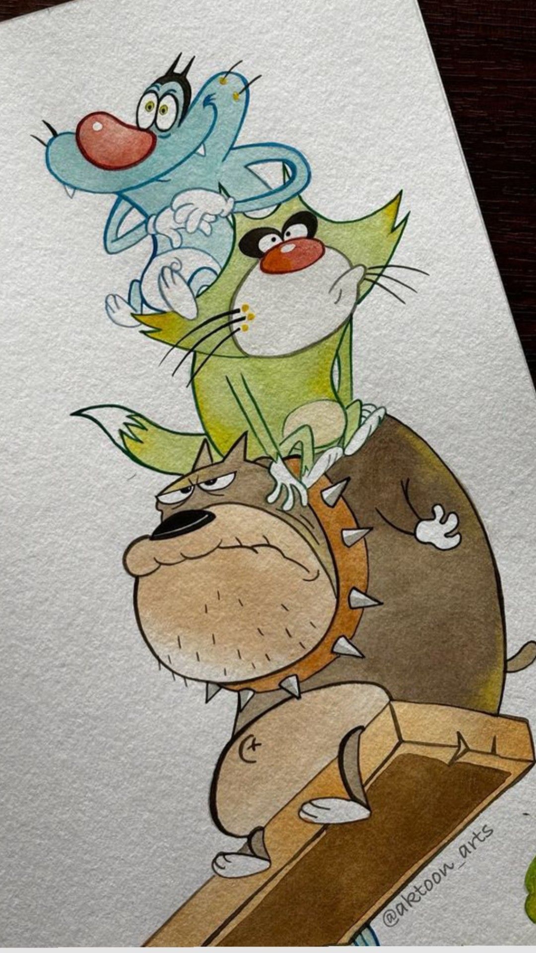 Artist holding a finished character reference sheet